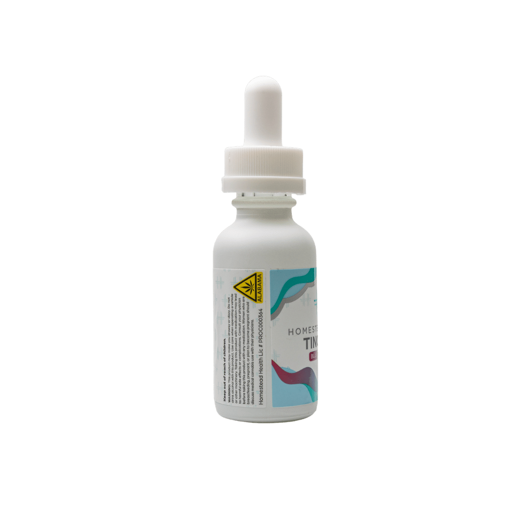 Left angled perspective of Homestead Health Blue Raspberry Tincture bottle.