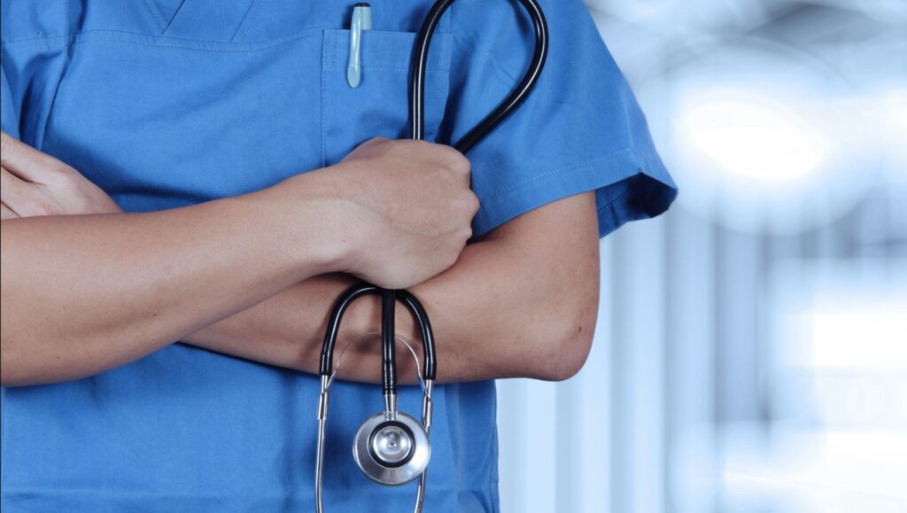 Physician in medical uniform who recommends approved medical cannabis forms in Alabama