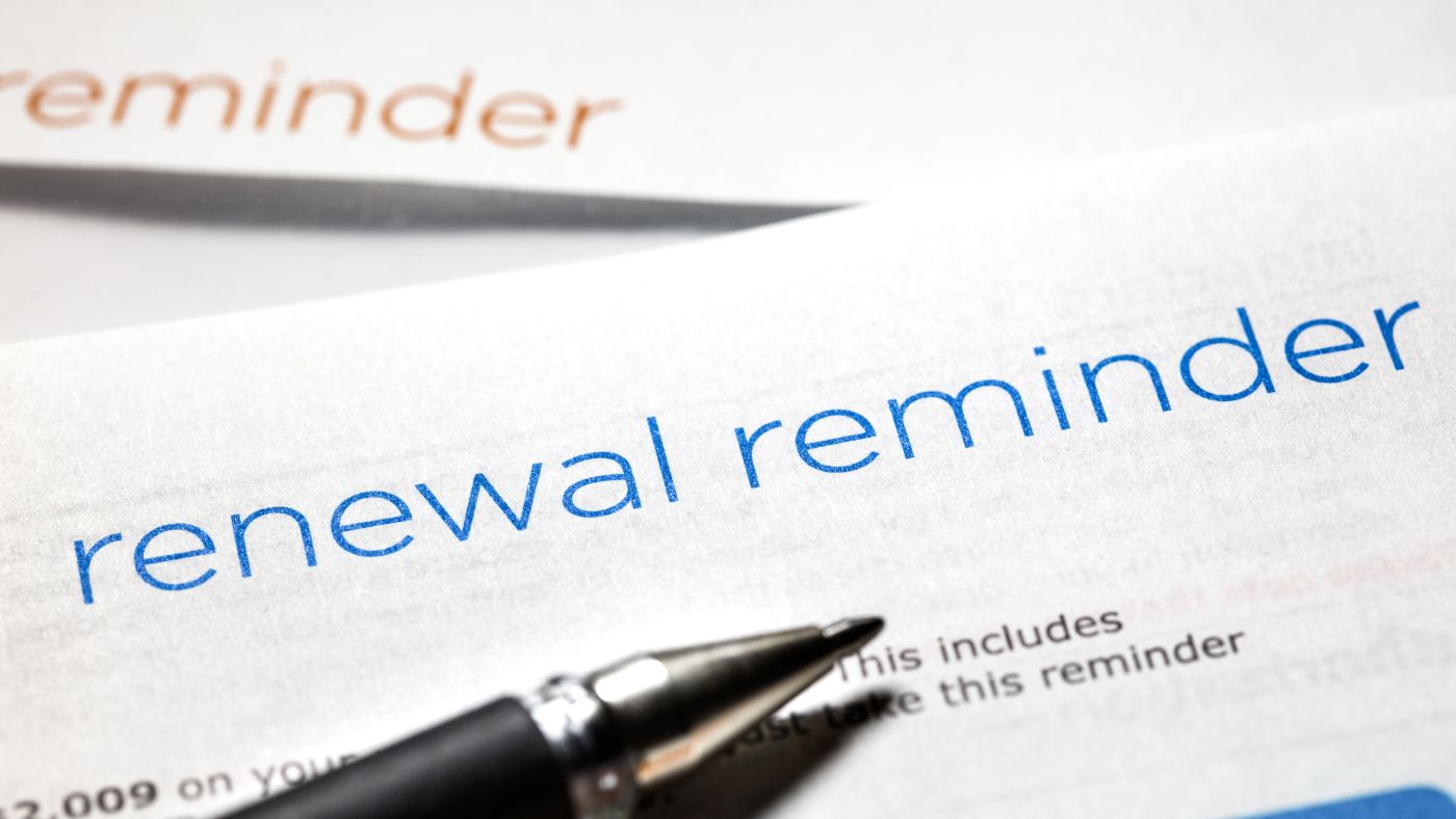 Close-up of official paperwork marked RENEWAL for an Alabama medical cannabis card certification.